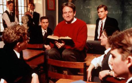 Dead Poets Society: John Keating enjoys placing both his his feet and his ass where they don't belong
