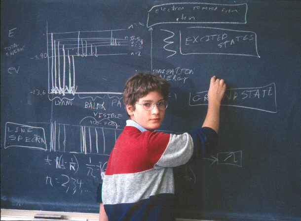 Marko explaining spectral shifts at a UBC blackboard